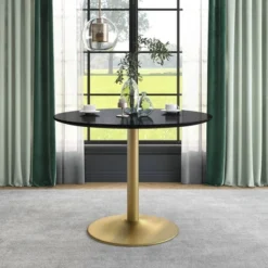 Koldfield Steel Base Round Dining Table - HOMES: Inside + Out
